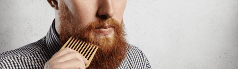 Man combing beard