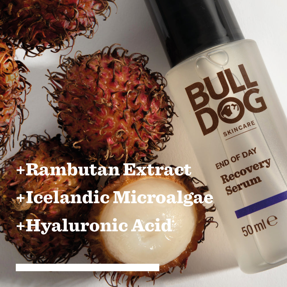 A bottle of End of Day Recovery Serum sits beside fresh rambutan. Text highlights ingredients such as Rambutan Extract, Icelandic Microalgae, and Hyaluronic Acid, known to help reduce the appearance of fine lines.