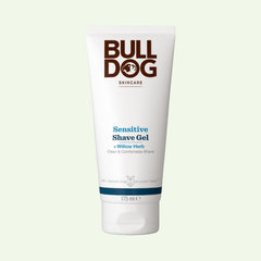 A white tube of Sensitive Shave Gel for men with natural ingredients and Willow Herb, designed for a clean, comfortable shave, 175 ml size, standing upright against a light background.