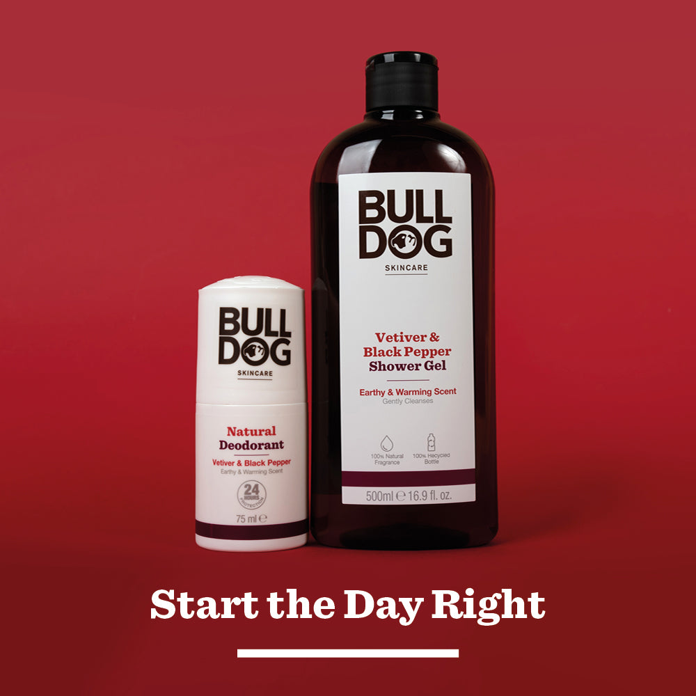 The Vetiver & Black Pepper Shower Gel from Bulldog Skincare, made with natural fragrance, is displayed against a red background above the text “Start the Day Right.”.