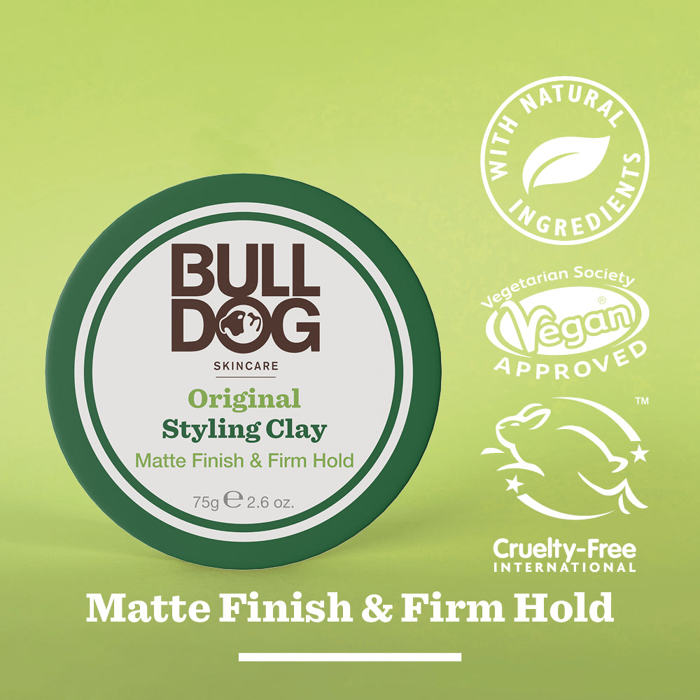 A round container of Bulldog Skincare Original Hair Styling Clay, labeled Matte Finish & Firm Hold. Surrounding icons highlight kaolin clay, vegan approval, and Cruelty-Free International certification.