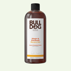 A 500ml (16.9 fl. oz.) bottle of Ginger & Patchouli Shower Gel with a black cap features a zesty, energized natural fragrance and gently cleanses mens skin.
