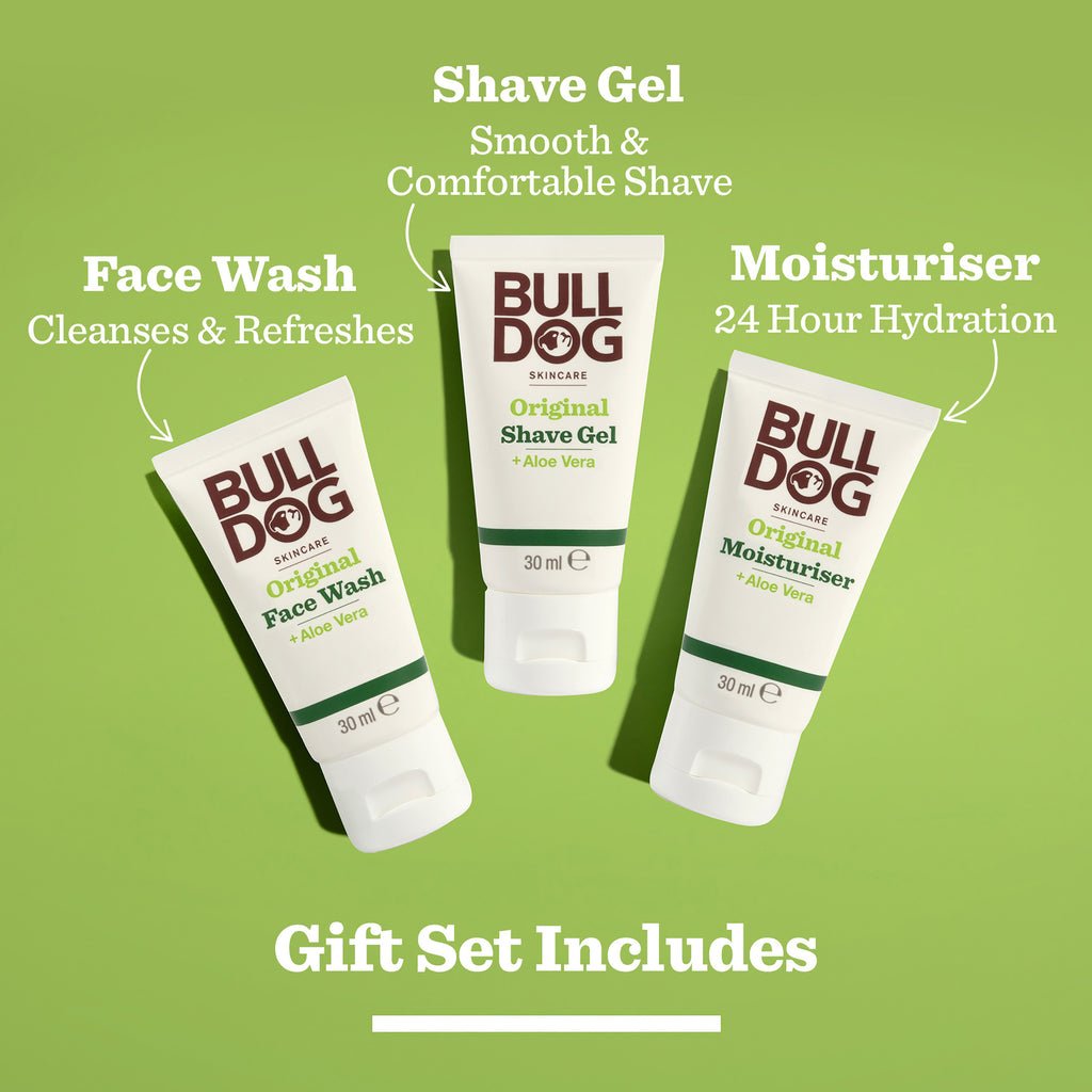 The Original Mini Skincare Trio—moisturiser, face wash, and shave gel—is displayed on a green background with highlighted benefits and "Bulldog gift set includes" below. Ideal for men’s grooming routines.