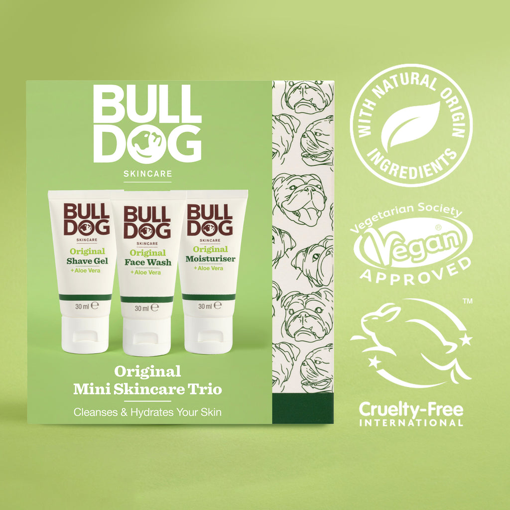 The Original Mini Skincare Trio gift set features men's grooming essentials: moisturiser, face wash, and shave gel. Icons indicate natural origin ingredients, vegan, and cruelty-free on a green background.