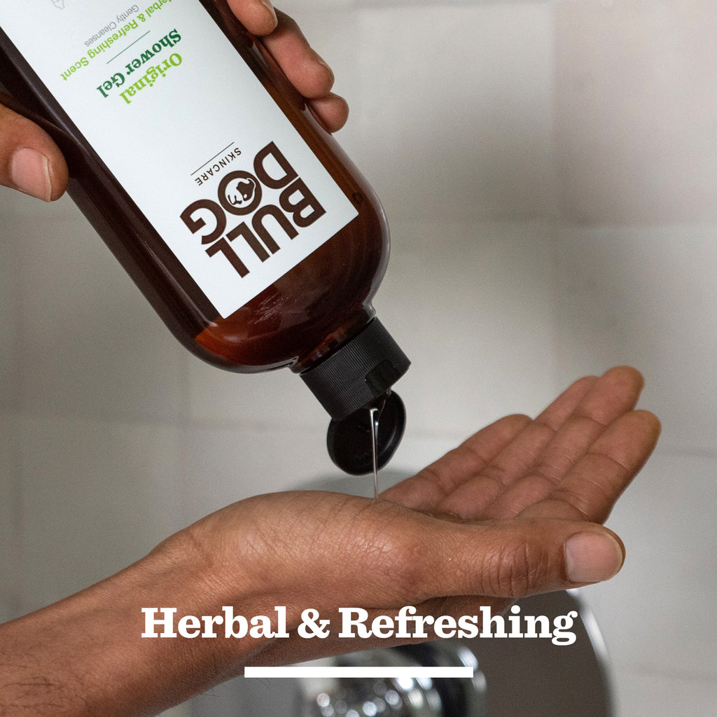 A person pours Premium Body Care Collection shower gel from a brown bottle into their hand over a sink, with “Herbal & Refreshing” below—ideal for men’s skincare routines or as thoughtful gifts for men.