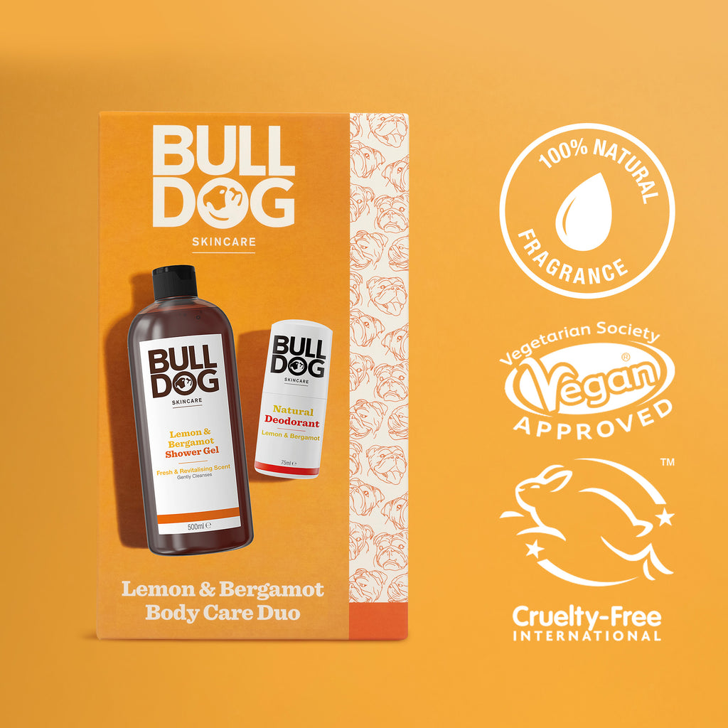 Lemon & Bergamot Body Care Duo—includes shower gel and deodorant—on an orange background. Great gift for men, featuring 100% natural fragrance, Vegan Approved, and Cruelty-Free International icons.