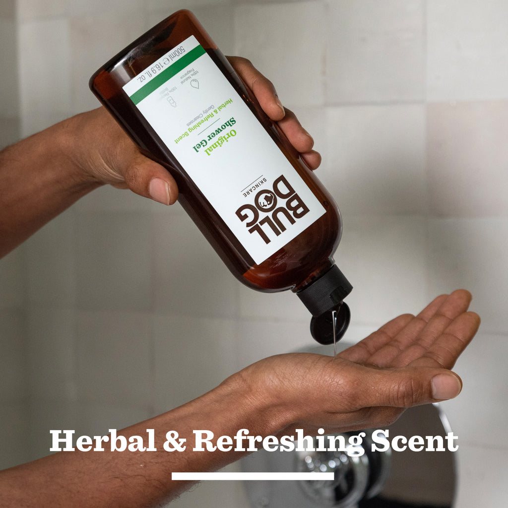 A person dispenses Original Morning Routine shower gel from a brown bottle onto their hand, with "Herbal & Refreshing Scent" overlaid—an ideal choice for a men’s gift set or thoughtful Christmas gift from Bulldog Skincare.