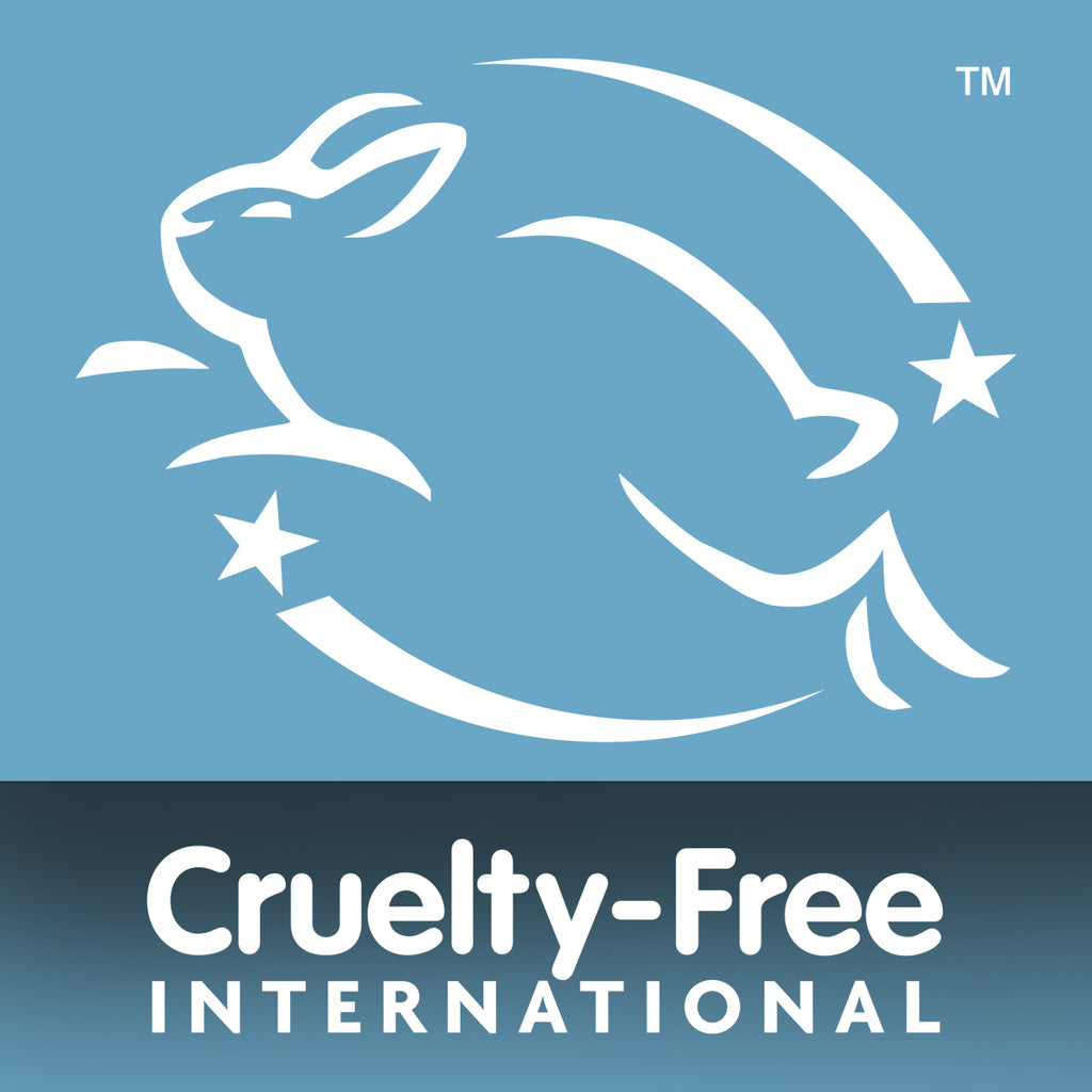 A white outline of a leaping rabbit with two stars on a blue background. Below, “Cruelty-Free International” is written in white—perfect for Sensitive Skin Bundle Collection users or anyone with delicate skin needs.