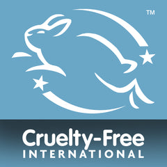 A white outline of a leaping rabbit with two stars on a blue background. Below, “Cruelty-Free International” is written in white—perfect for Sensitive Skin Bundle Collection users or anyone with delicate skin needs.